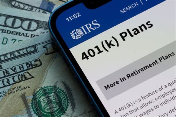 How does contributing to a 401k retirement plan reduce taxes?