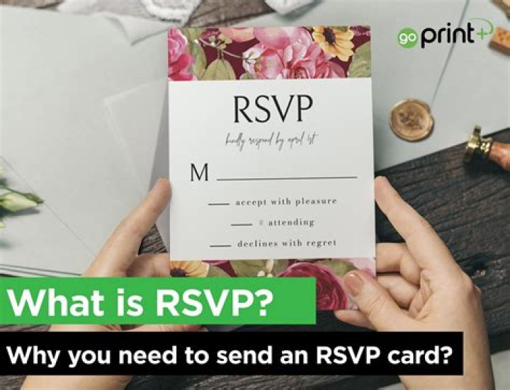 What does RSVP mean in a business invitation?