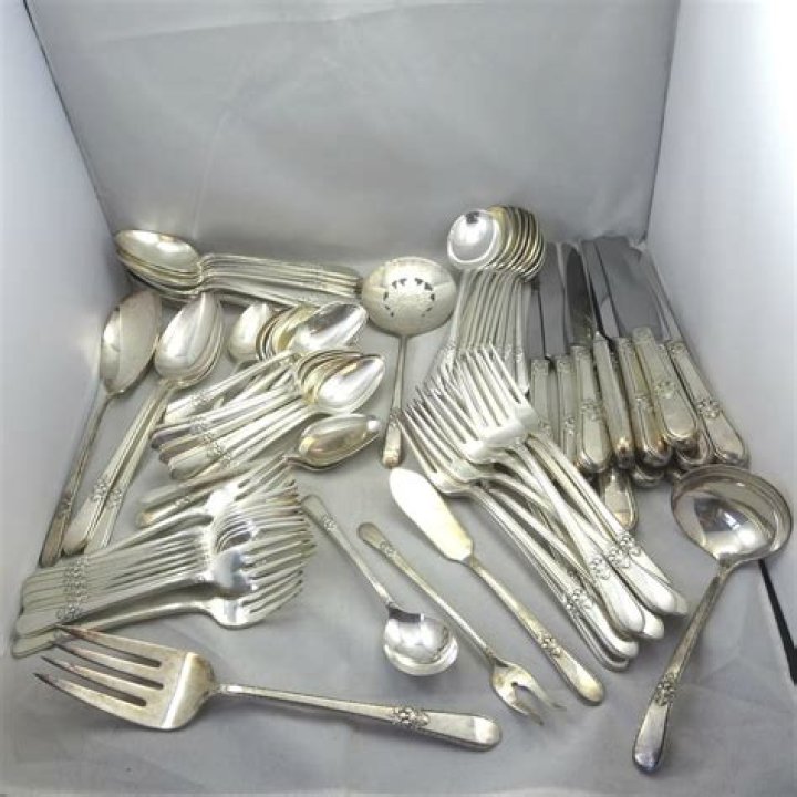 What does sterling silver flatware weigh?