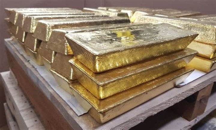 What is stamped on gold bars?