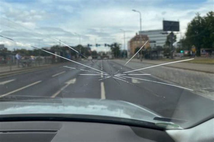 Who is responsible for rock hitting windshield?