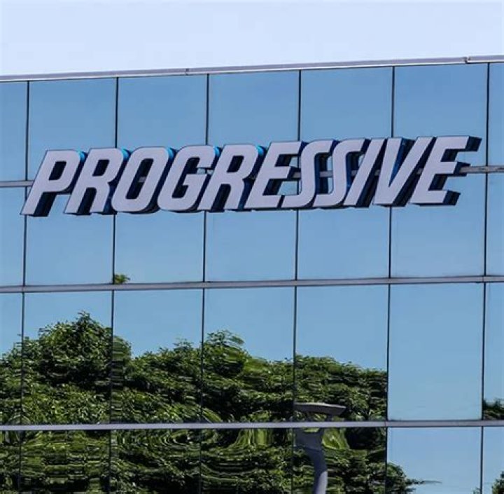 Who is the head of Progressive Insurance Company?