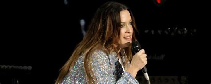 Why did Alanis Morisette become an American citizen?