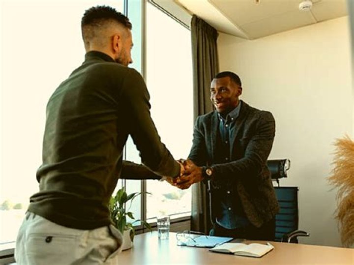 Why should you shake an interviewers hand?